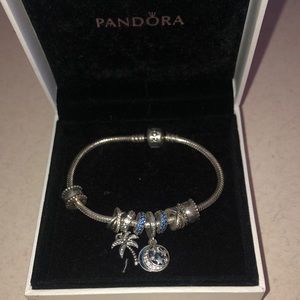 Pandora bracelet with 6 charms & 2 spacers